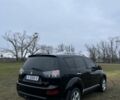 Черный Мицубиси Аутлендер, объемом двигателя 2.4 л и пробегом 230 тыс. км за 8800 $, фото 2 на Automoto.ua