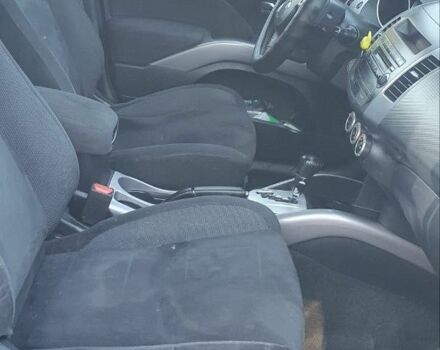 Чорний Міцубісі Аутлендер, об'ємом двигуна 2.4 л та пробігом 325 тис. км за 7500 $, фото 8 на Automoto.ua