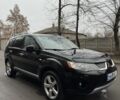 Черный Мицубиси Аутлендер, объемом двигателя 2 л и пробегом 377 тыс. км за 5200 $, фото 8 на Automoto.ua