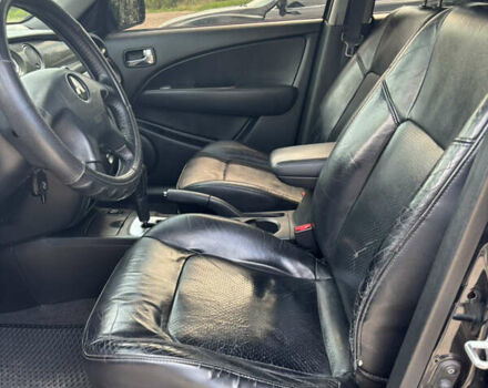 Мицубиси Аутлендер 2008 в Днепре (Днепропетровске) на Automoto.ua Черный Мицубиси Аутлендер, объемом двигателя 2.38 л и пробегом 320 тыс. км за 7500 $, фото 15 на Automoto.ua