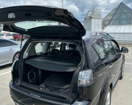 Чорний Міцубісі Аутлендер, об'ємом двигуна 2.4 л та пробігом 137 тис. км за 8999 $, фото 4 на Automoto.ua