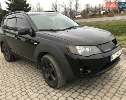 Чорний Міцубісі Аутлендер, об'ємом двигуна 2.4 л та пробігом 199 тис. км за 8999 $, фото 7 на Automoto.ua