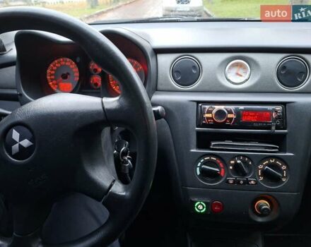 Чорний Міцубісі Аутлендер, об'ємом двигуна 2 л та пробігом 191 тис. км за 7100 $, фото 12 на Automoto.ua