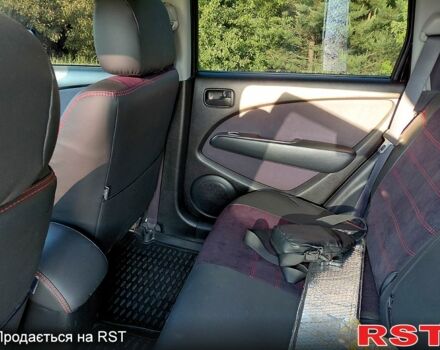 Чорний Міцубісі Аутлендер, об'ємом двигуна 2 л та пробігом 143 тис. км за 8200 $, фото 3 на Automoto.ua