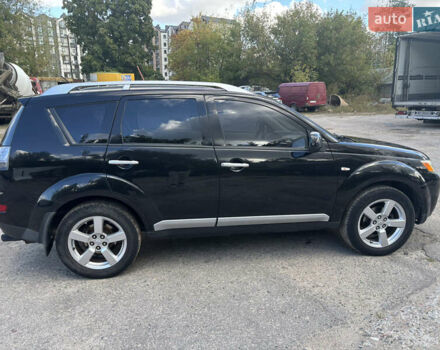 Черный Мицубиси Аутлендер, объемом двигателя 2.36 л и пробегом 286 тыс. км за 9200 $, фото 6 на Automoto.ua