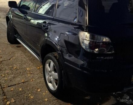 Чорний Міцубісі Аутлендер, об'ємом двигуна 2 л та пробігом 117 тис. км за 7900 $, фото 4 на Automoto.ua