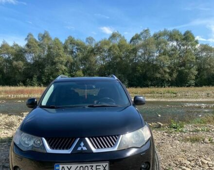Черный Мицубиси Аутлендер, объемом двигателя 3 л и пробегом 150 тыс. км за 400 $, фото 1 на Automoto.ua