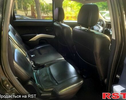 Черный Мицубиси Аутлендер, объемом двигателя 2.4 л и пробегом 230 тыс. км за 8500 $, фото 6 на Automoto.ua