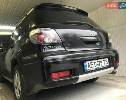 Чорний Міцубісі Аутлендер, об'ємом двигуна 2.38 л та пробігом 207 тис. км за 7000 $, фото 50 на Automoto.ua