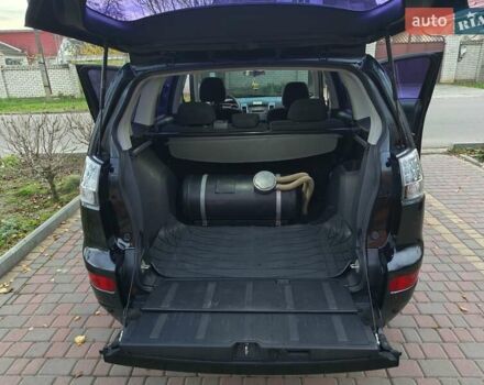 Черный Мицубиси Аутлендер, объемом двигателя 2.36 л и пробегом 192 тыс. км за 8800 $, фото 19 на Automoto.ua