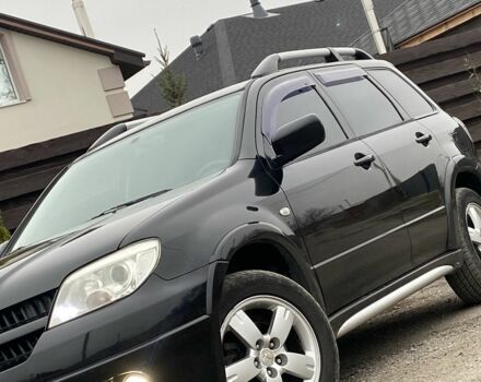 Черный Мицубиси Аутлендер, объемом двигателя 2.4 л и пробегом 178 тыс. км за 6900 $, фото 9 на Automoto.ua