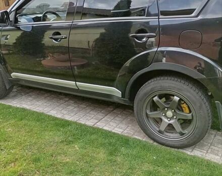 Черный Мицубиси Аутлендер, объемом двигателя 2.35 л и пробегом 245 тыс. км за 8000 $, фото 19 на Automoto.ua