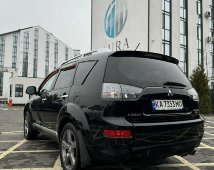 Черный Мицубиси Аутлендер, объемом двигателя 2.36 л и пробегом 120 тыс. км за 10100 $, фото 4 на Automoto.ua