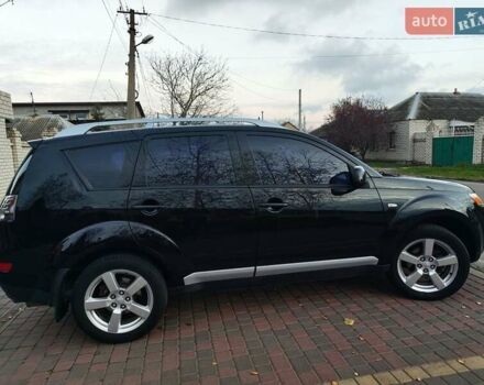 Черный Мицубиси Аутлендер, объемом двигателя 2.36 л и пробегом 192 тыс. км за 8800 $, фото 12 на Automoto.ua