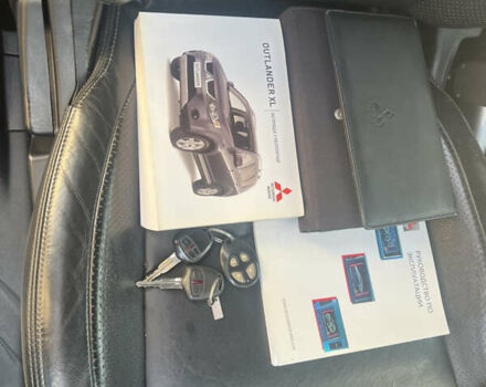 Чорний Міцубісі Аутлендер, об'ємом двигуна 2.4 л та пробігом 221 тис. км за 8900 $, фото 33 на Automoto.ua