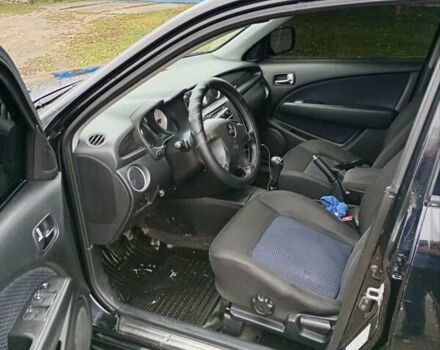 Черный Мицубиси Аутлендер, объемом двигателя 2 л и пробегом 209 тыс. км за 5700 $, фото 2 на Automoto.ua