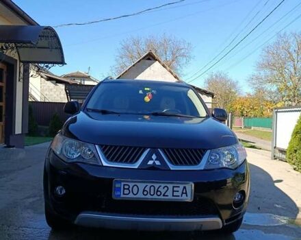 Черный Мицубиси Аутлендер, объемом двигателя 2.36 л и пробегом 203 тыс. км за 9200 $, фото 2 на Automoto.ua