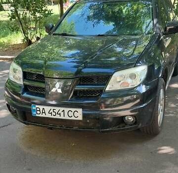 Черный Мицубиси Аутлендер, объемом двигателя 2.4 л и пробегом 150 тыс. км за 6300 $, фото 7 на Automoto.ua