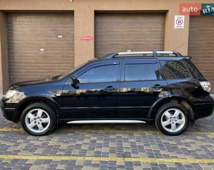 Черный Мицубиси Аутлендер, объемом двигателя 2 л и пробегом 270 тыс. км за 7199 $, фото 13 на Automoto.ua