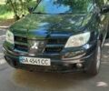 Черный Мицубиси Аутлендер, объемом двигателя 2.4 л и пробегом 150 тыс. км за 6300 $, фото 7 на Automoto.ua