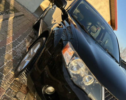 Черный Мицубиси Аутлендер, объемом двигателя 2.36 л и пробегом 253 тыс. км за 9600 $, фото 6 на Automoto.ua