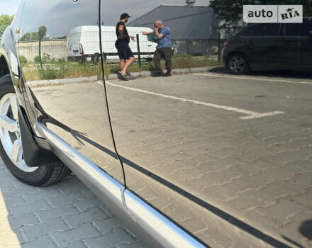 Чорний Міцубісі Аутлендер, об'ємом двигуна 2.4 л та пробігом 210 тис. км за 9700 $, фото 46 на Automoto.ua