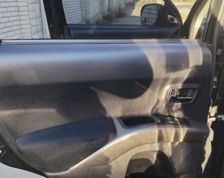 Черный Мицубиси Аутлендер, объемом двигателя 2.4 л и пробегом 199 тыс. км за 9000 $, фото 5 на Automoto.ua