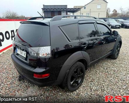 Черный Мицубиси Аутлендер, объемом двигателя 2.4 л и пробегом 200 тыс. км за 9999 $, фото 5 на Automoto.ua