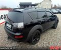 Черный Мицубиси Аутлендер, объемом двигателя 2.4 л и пробегом 200 тыс. км за 9999 $, фото 5 на Automoto.ua