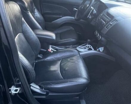 Черный Мицубиси Аутлендер, объемом двигателя 2.4 л и пробегом 290 тыс. км за 9500 $, фото 21 на Automoto.ua