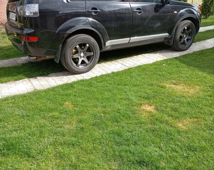 Черный Мицубиси Аутлендер, объемом двигателя 2.35 л и пробегом 245 тыс. км за 8000 $, фото 21 на Automoto.ua