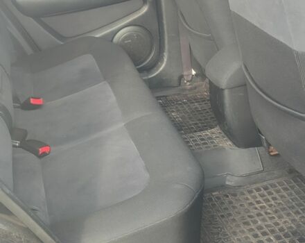 Черный Мицубиси Аутлендер, объемом двигателя 2 л и пробегом 212 тыс. км за 6900 $, фото 5 на Automoto.ua