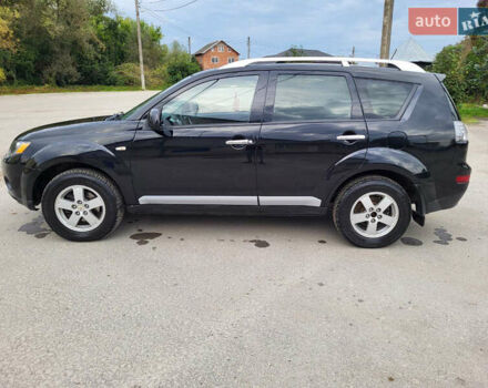Чорний Міцубісі Аутлендер, об'ємом двигуна 2.4 л та пробігом 205 тис. км за 8400 $, фото 16 на Automoto.ua