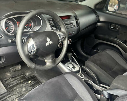 Черный Мицубиси Аутлендер, объемом двигателя 2.4 л и пробегом 199 тыс. км за 8777 $, фото 11 на Automoto.ua
