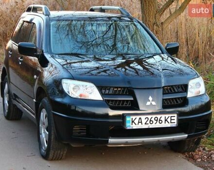 Черный Мицубиси Аутлендер, объемом двигателя 2 л и пробегом 189 тыс. км за 7200 $, фото 37 на Automoto.ua