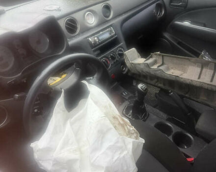 Черный Мицубиси Аутлендер, объемом двигателя 2 л и пробегом 200 тыс. км за 2999 $, фото 17 на Automoto.ua