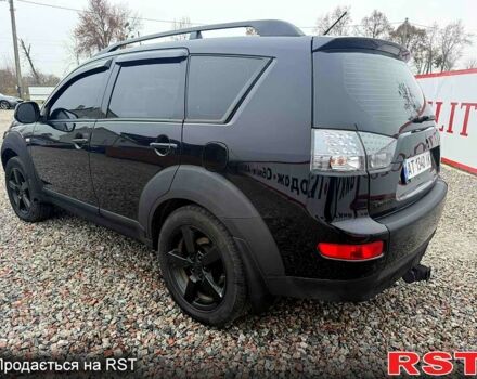 Черный Мицубиси Аутлендер, объемом двигателя 2.4 л и пробегом 200 тыс. км за 9999 $, фото 3 на Automoto.ua