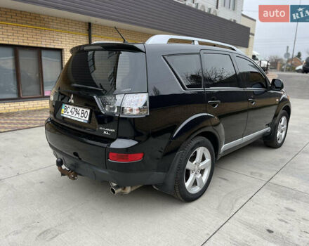 Чорний Міцубісі Аутлендер, об'ємом двигуна 2.4 л та пробігом 221 тис. км за 8900 $, фото 11 на Automoto.ua