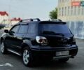 Чорний Міцубісі Аутлендер, об'ємом двигуна 2 л та пробігом 174 тис. км за 6450 $, фото 12 на Automoto.ua