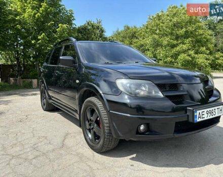 Мицубиси Аутлендер 2008 в Днепре (Днепропетровске) на Automoto.ua Черный Мицубиси Аутлендер, объемом двигателя 2.38 л и пробегом 320 тыс. км за 7500 $, фото 1 на Automoto.ua