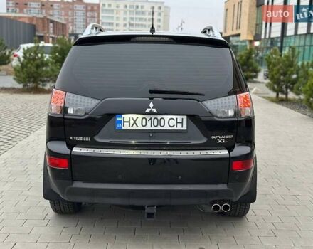 Черный Мицубиси Аутлендер, объемом двигателя 3 л и пробегом 248 тыс. км за 9800 $, фото 24 на Automoto.ua