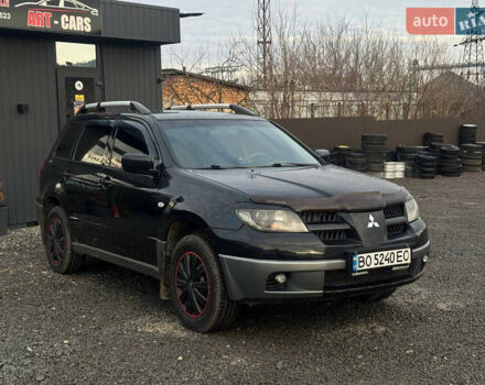 Черный Мицубиси Аутлендер, объемом двигателя 2 л и пробегом 240 тыс. км за 5500 $, фото 4 на Automoto.ua