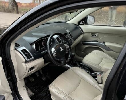 Черный Мицубиси Аутлендер, объемом двигателя 2 л и пробегом 377 тыс. км за 5200 $, фото 10 на Automoto.ua