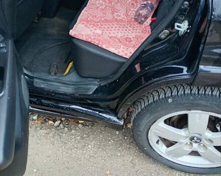 Черный Мицубиси Аутлендер, объемом двигателя 2 л и пробегом 209 тыс. км за 5700 $, фото 1 на Automoto.ua