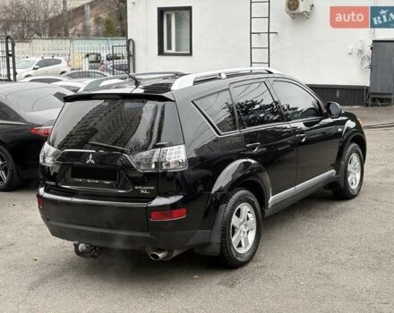 Черный Мицубиси Аутлендер, объемом двигателя 2.4 л и пробегом 185 тыс. км за 7900 $, фото 7 на Automoto.ua