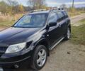 Міцубісі Аутлендер 2008 у Івано-Франківську на Automoto.ua Чорний Міцубісі Аутлендер, об'ємом двигуна 2 л та пробігом 128 тис. км за 7000 $, фото 1 на Automoto.ua