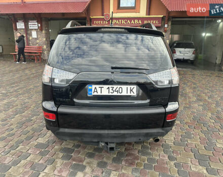 Черный Мицубиси Аутлендер, объемом двигателя 2.4 л и пробегом 199 тыс. км за 8777 $, фото 3 на Automoto.ua