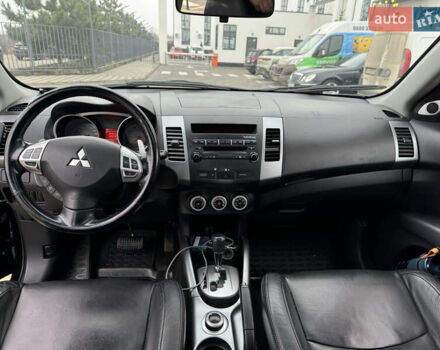 Черный Мицубиси Аутлендер, объемом двигателя 2.36 л и пробегом 120 тыс. км за 10100 $, фото 19 на Automoto.ua
