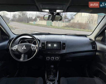 Чорний Міцубісі Аутлендер, об'ємом двигуна 2.36 л та пробігом 293 тис. км за 7900 $, фото 21 на Automoto.ua