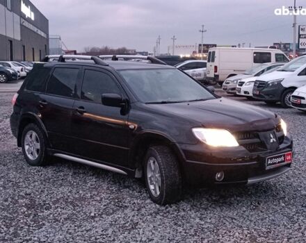 Черный Мицубиси Аутлендер, объемом двигателя 2 л и пробегом 271 тыс. км за 6940 $, фото 11 на Automoto.ua